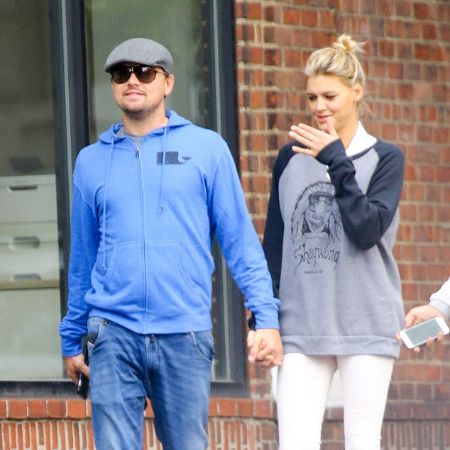 Leonardo and Kelly holding hands